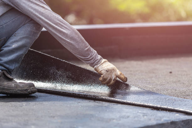 Professional Basement Waterproofing technician working in Knoxville, IL